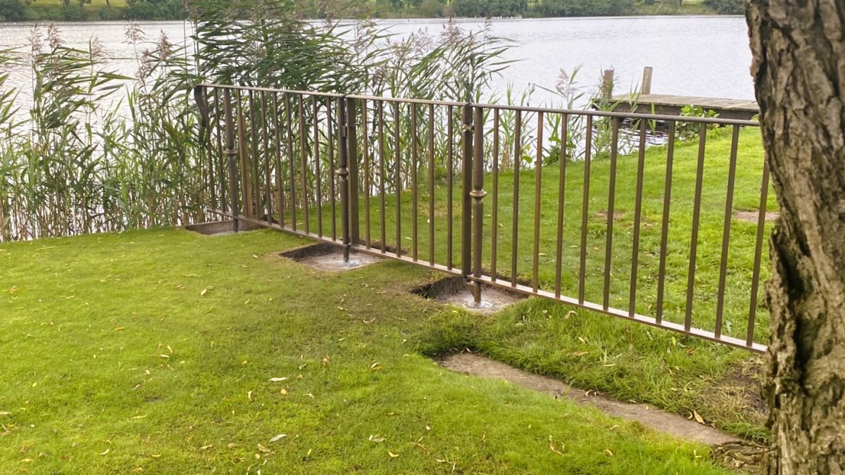 Low level bronze railings to the waterside. Each including a single passenger gate. Work carried out by Calibre Metalwork.