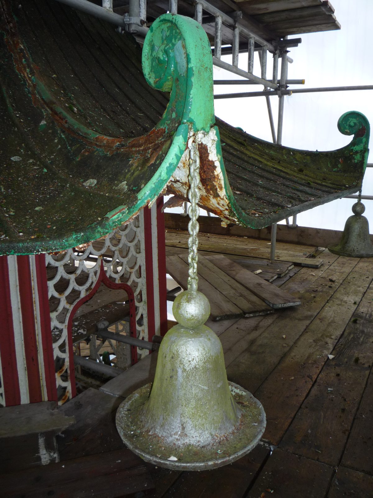 A photograph of a bell at Alton Towers' Chinese Pagoda during the restoration by Calibre Metalwork.