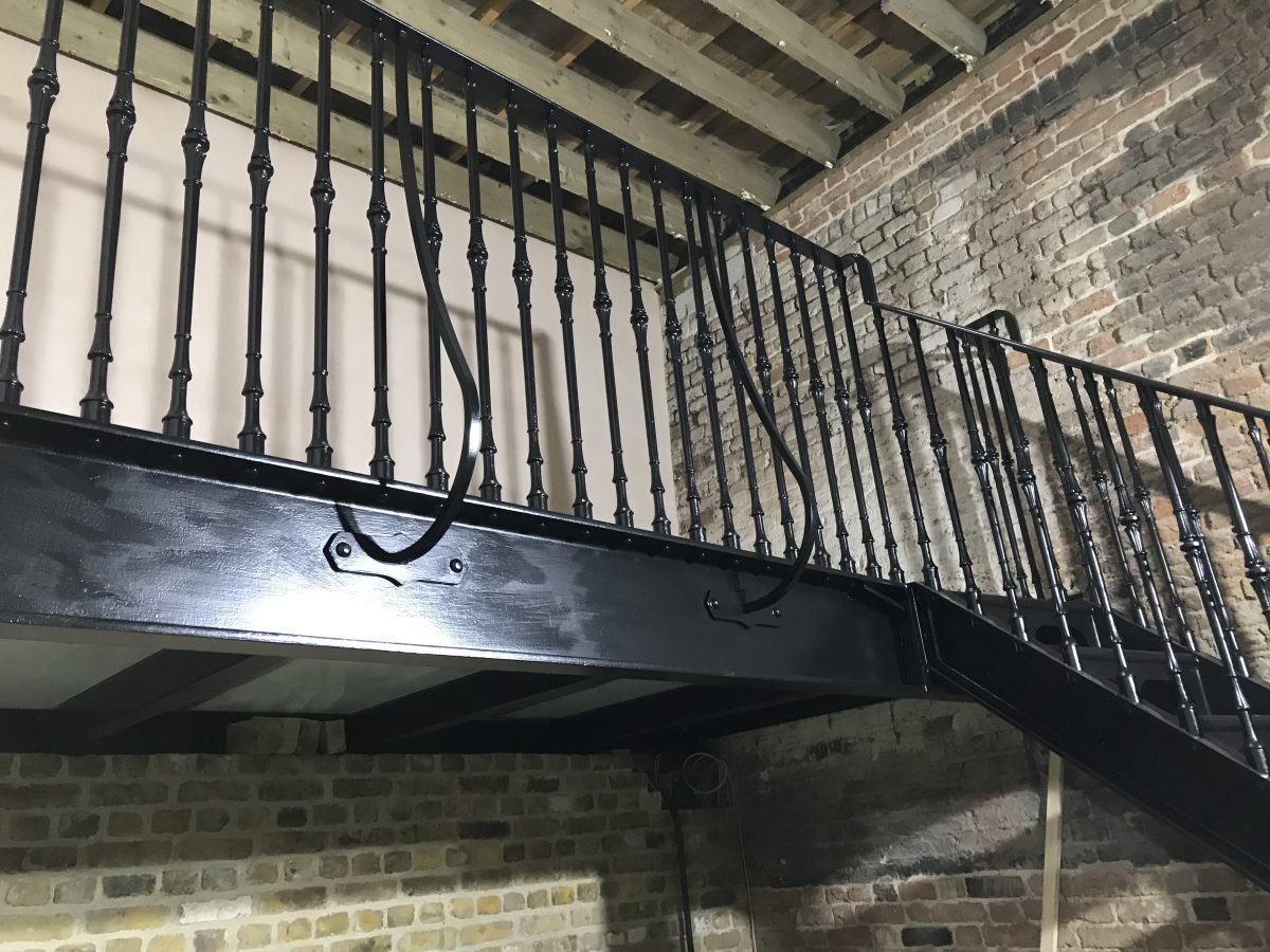 A photograph of a stunning new staircase for a private client in Chelsea manufactured by Calibre Metalwork.