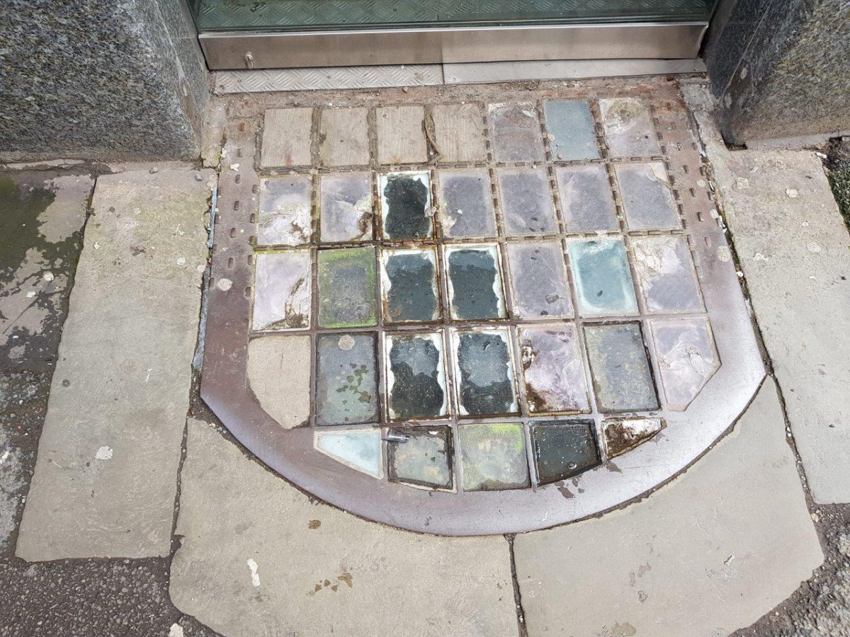 A photograph of the original pavement lights at Dale Street in Manchester prior to replication by Calibre Metalwork.