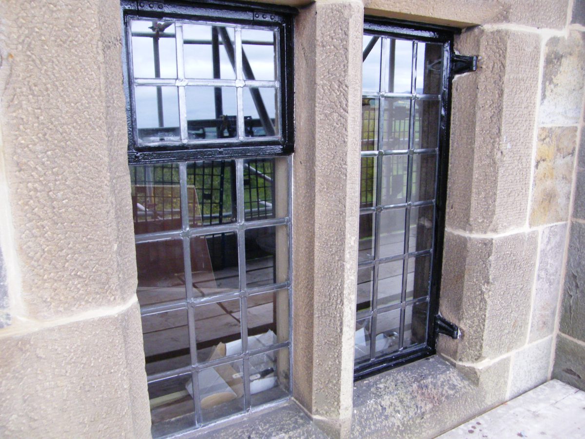 A photograph of one of Calibre Metalwork's finished restored window sets at Grade I listed Ford Castle, Berwick-upon-Tweed, Northumberland.