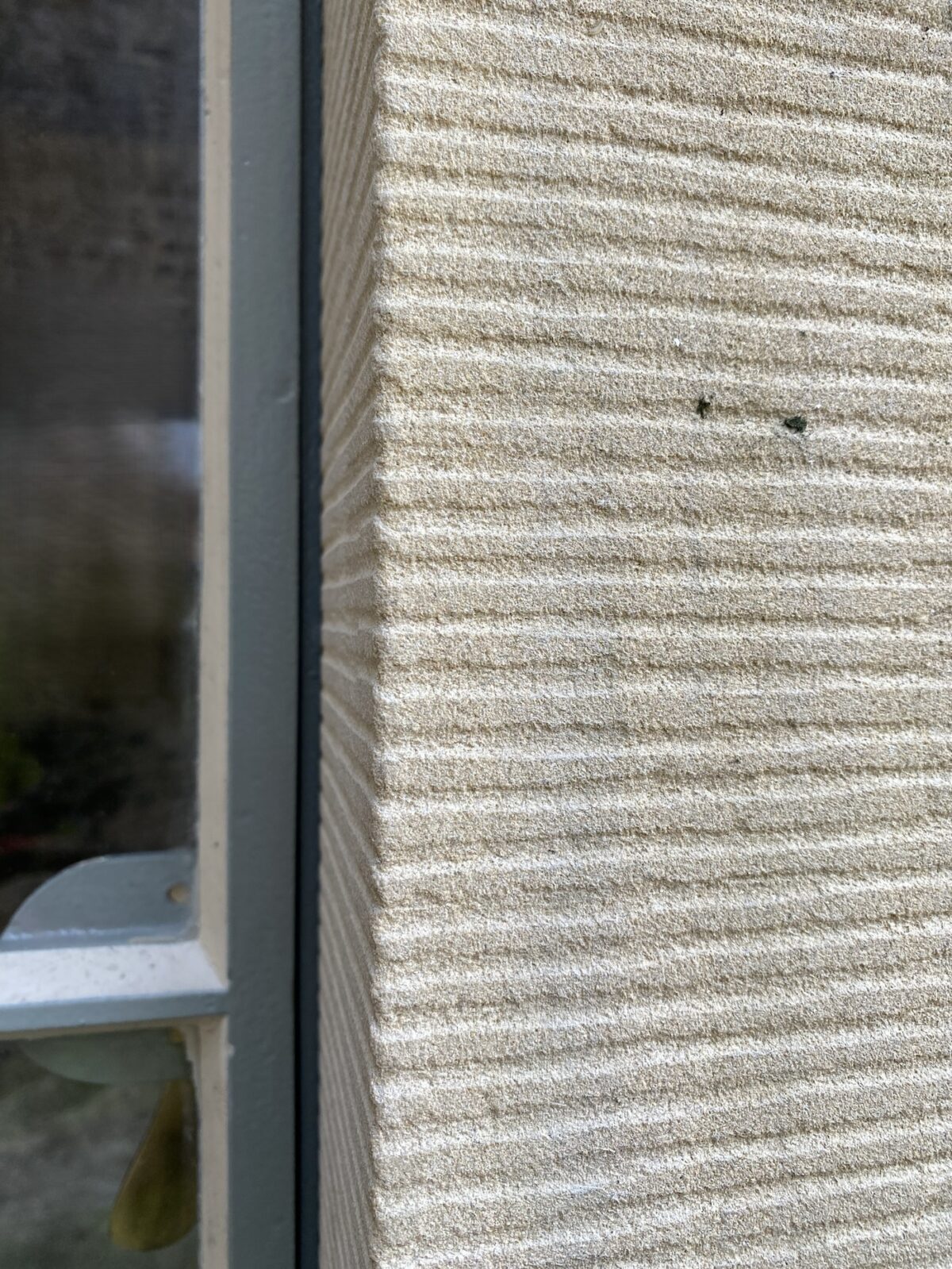 A photograph of a window showing Incredibly tight tolerances that are used to maximise a window opening.